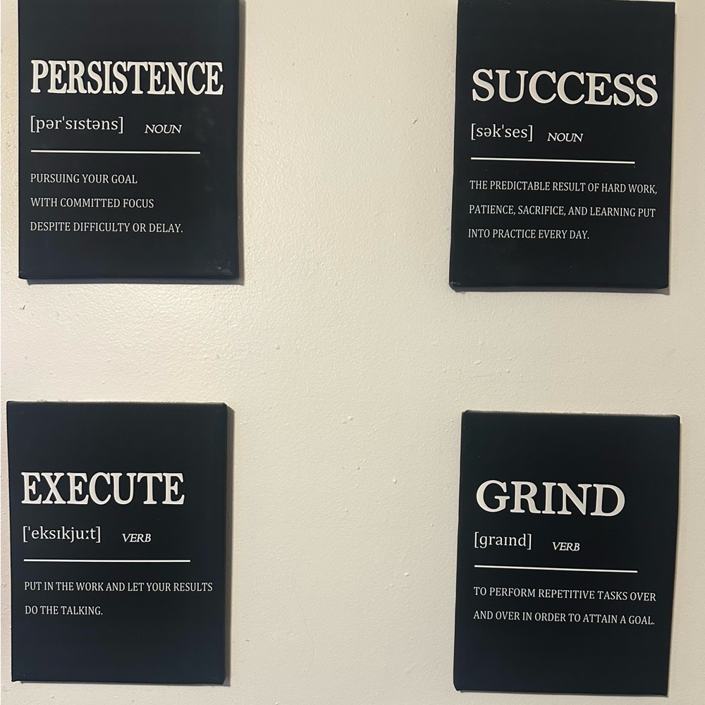Black and white set of motivational canvas prints.